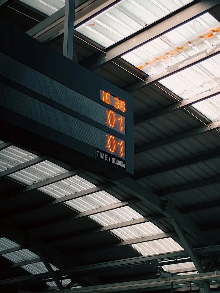 a-clock-in-a-railway-station-24973397